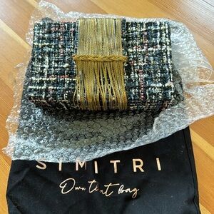 Brand new sold out Simitri tweed clutch with gold fringe detail
